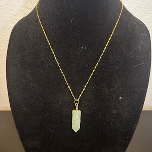Elegant Gold Necklace with Green Pendant